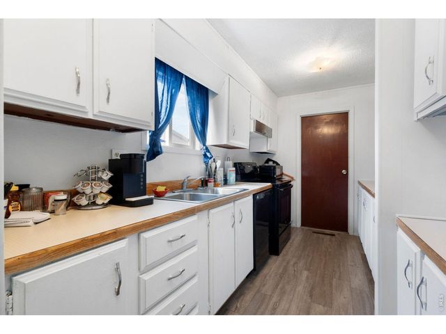 110 Ash St, Log Lane Village, CO 80705