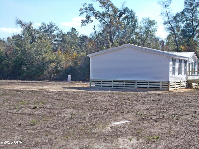 6905 Bateau Pond Lane, Grand Ridge, FL 32442