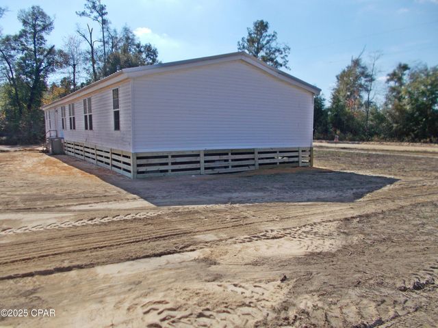 6905 Bateau Pond Lane, Grand Ridge, FL 32442