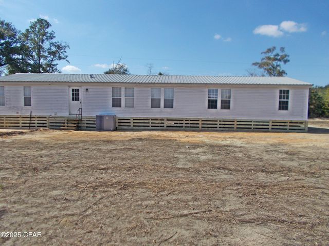 6905 Bateau Pond Lane, Grand Ridge, FL 32442