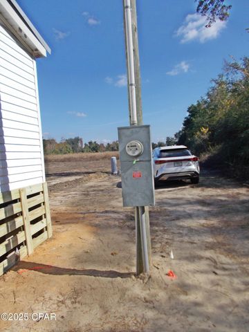 6905 Bateau Pond Lane, Grand Ridge, FL 32442