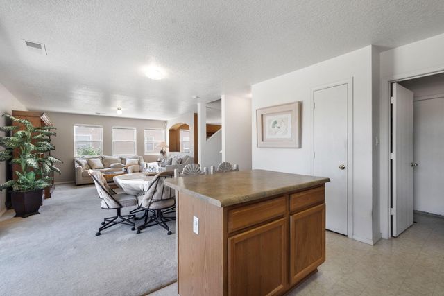 1813 Sierra Norte Loop NE, Rio Rancho, NM 87144