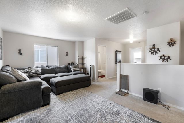1813 Sierra Norte Loop NE, Rio Rancho, NM 87144