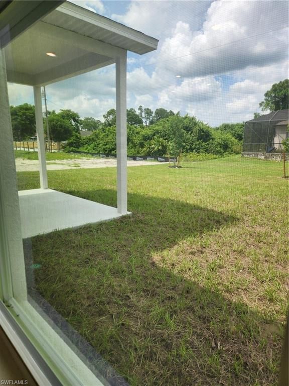 3902 28th ST SW, LEHIGH ACRES, FL 33976 — photo 2