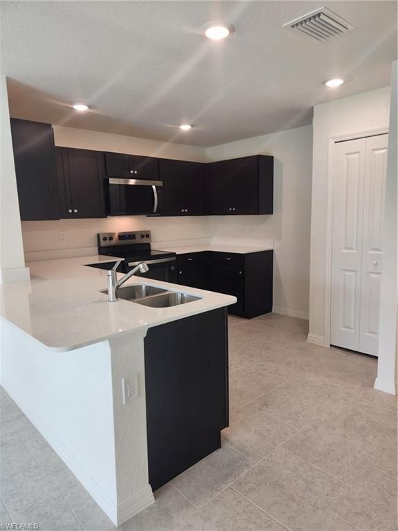 3902 28th ST SW, LEHIGH ACRES, FL 33976 — photo 5