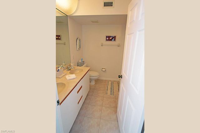 113 Wading Bird Cir Apt 102, Naples, FL 34110