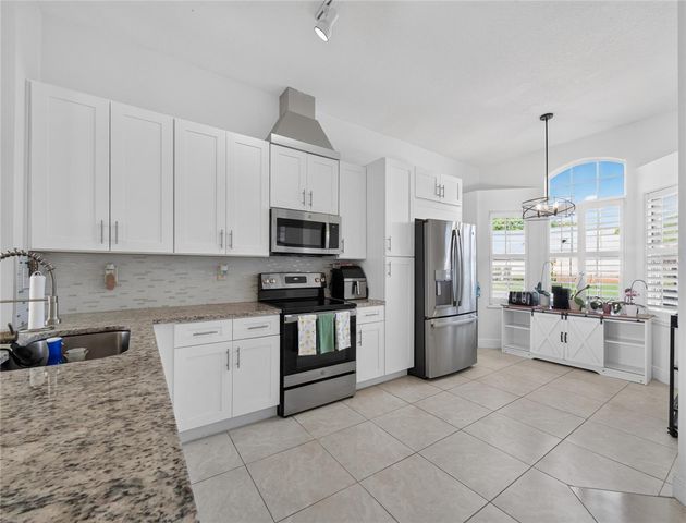 14435 WINDCHIME LANE, Orlando, FL 32837