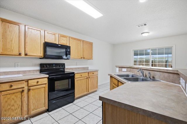 1438 BLUES CREEK Drive, Jacksonville, FL 32221