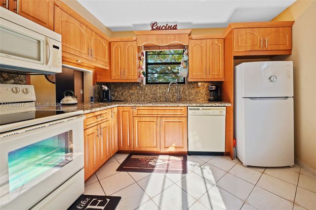 4950 E Sabal Palm Blvd 310, Tamarac, FL 33319