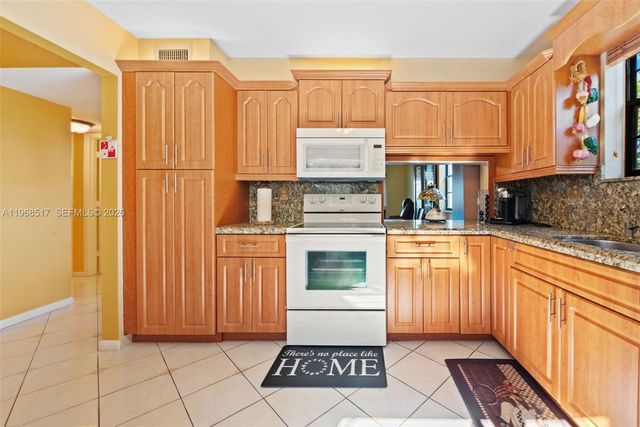 4950 E Sabal Palm Blvd 310, Tamarac, FL 33319