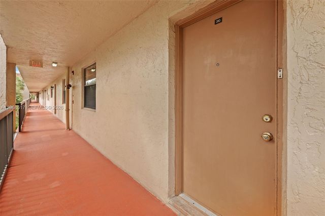 4950 E Sabal Palm Blvd 310, Tamarac, FL 33319