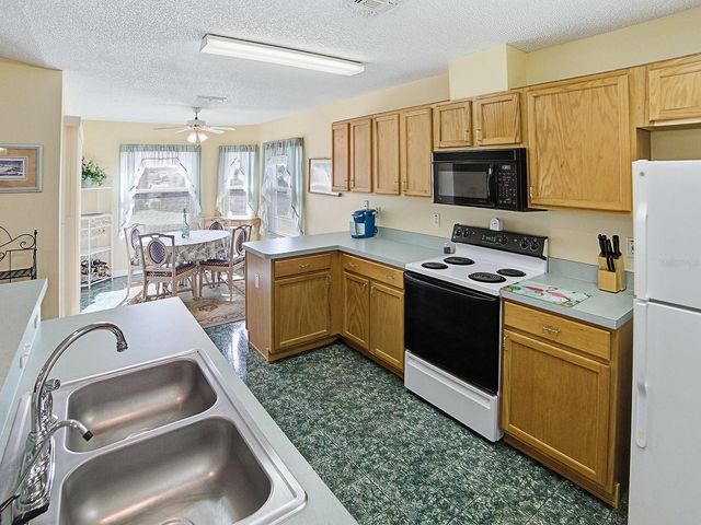 32914 CROOKED OAKS LANE, Leesburg, FL 34748
