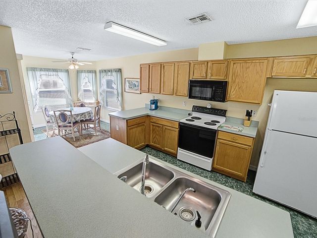 32914 CROOKED OAKS LANE, Leesburg, FL 34748