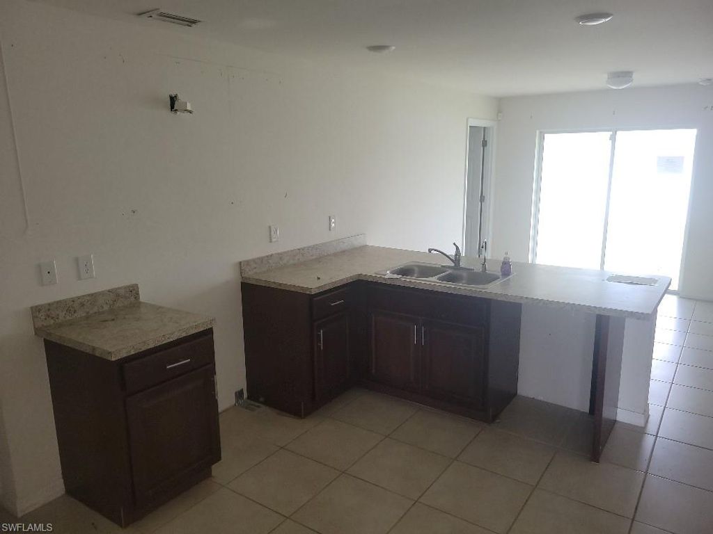 1125 NE 36th ST, CAPE CORAL, FL 33909 — photo 2