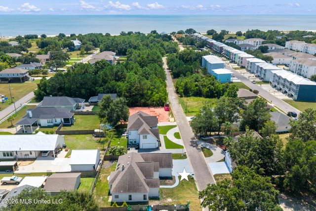 22 Pelican Cove Lane, Long Beach, MS 39560