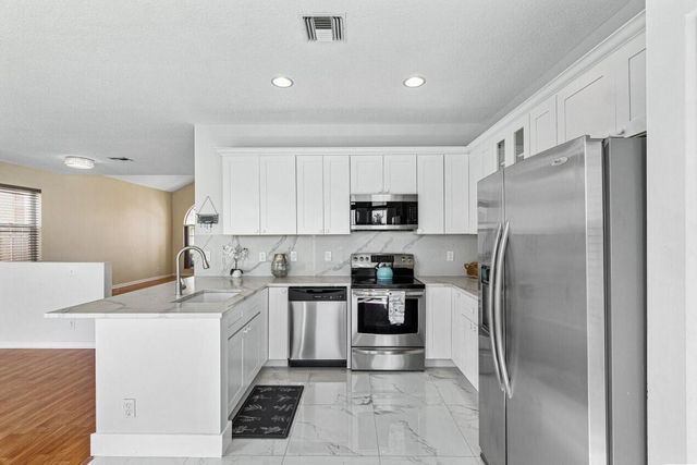 7835 Springfield Lake Drive, Lake Worth, FL 33467
