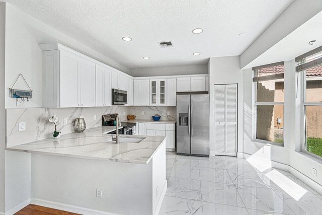 7835 Springfield Lake Drive, Lake Worth, FL 33467