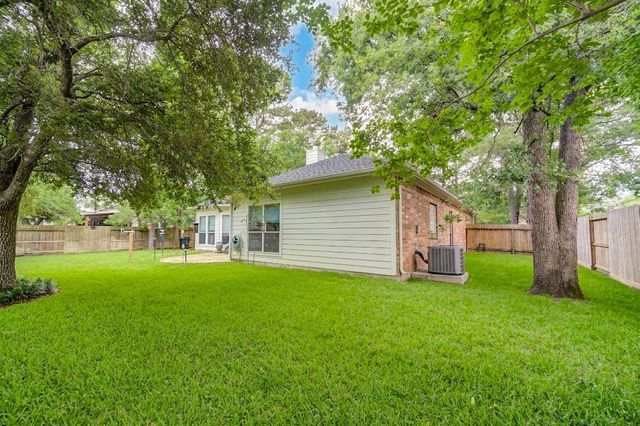 7902 Trophy Place Drive, Humble, TX 77346