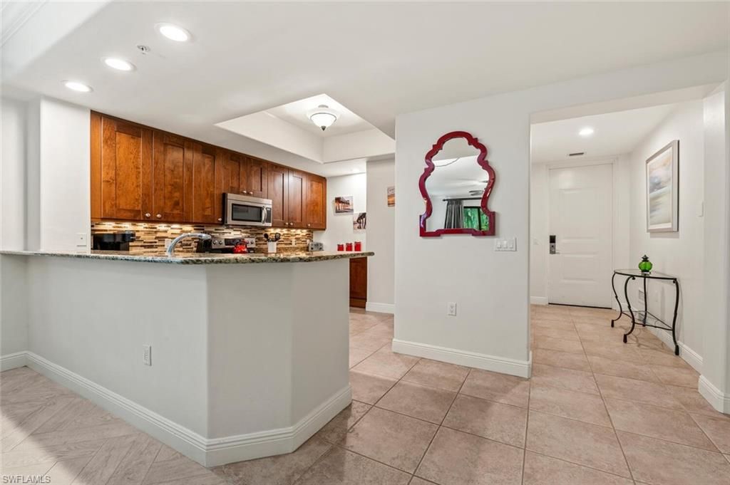 1035 SANDPIPER ST F-104, NAPLES, FL 34102 — photo 5