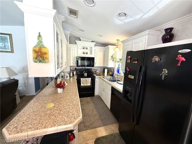 1658 Diamond Lake CIR, Naples, FL 34114