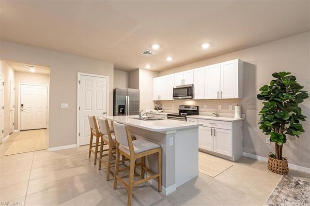 15457 Wildflower CIR, Naples, FL 34119