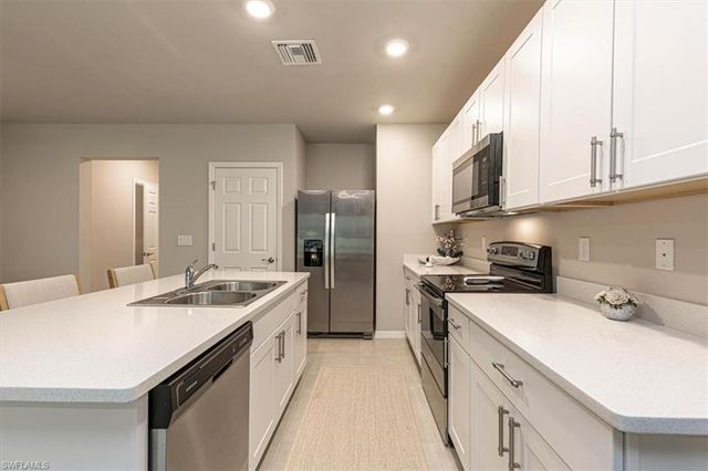 15457 Wildflower CIR, Naples, FL 34119