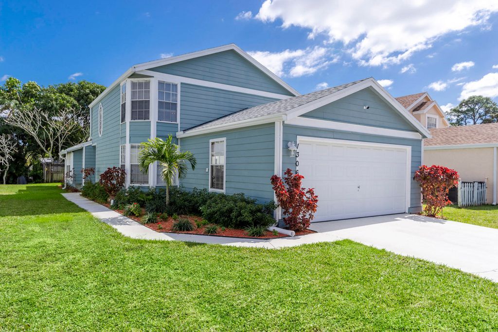 1306 Wild Daisy Lane, West Palm Beach, FL 33415