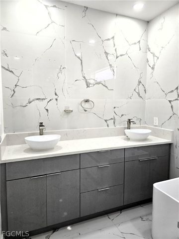 3313 8th ST W, Lehigh Acres, FL 33971