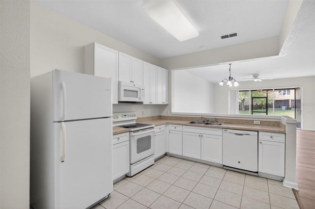 3497 SHALLOT DRIVE 102, Orlando, FL 32835