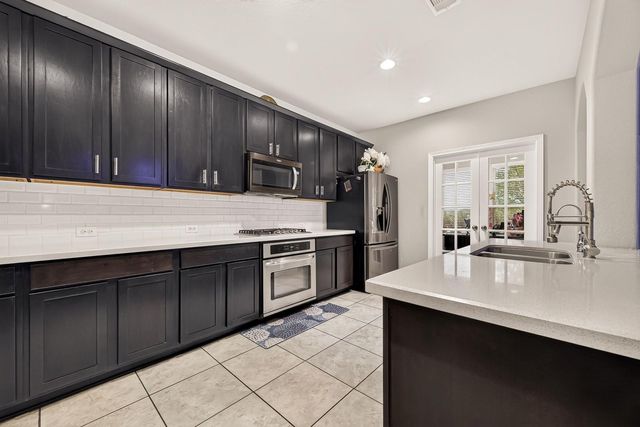 9110 Hollowcreek Point Lane, Cypress, TX 77433