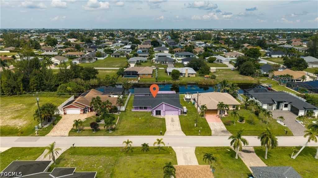 Image 1 of property listing at 2704 SW 2nd PL, Cape Coral, FL 33914