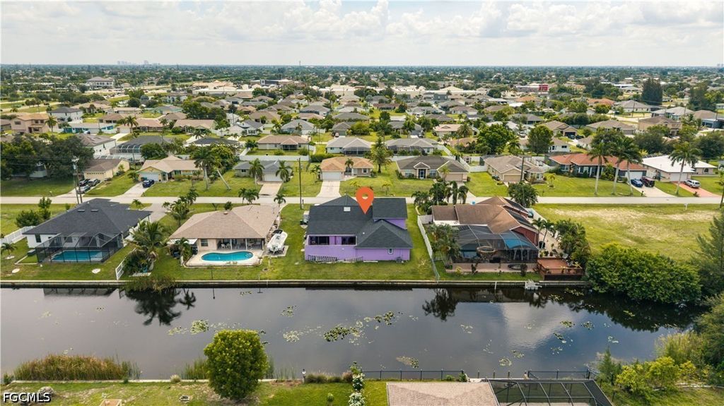 Image 2 of property listing at 2704 SW 2nd PL, Cape Coral, FL 33914