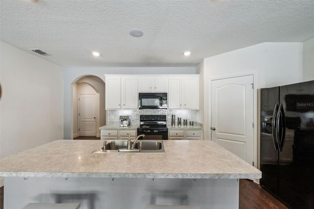 5946 CHURCHILL SQ WAY, Groveland, FL 34736