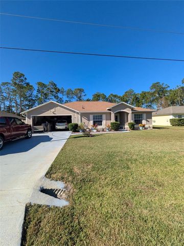 26 POINBURY DRIVE, Palm Coast, FL 32164