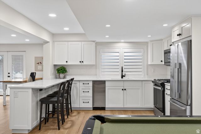 5873 S JORDAN CANAL RD, Taylorsville, UT 84129