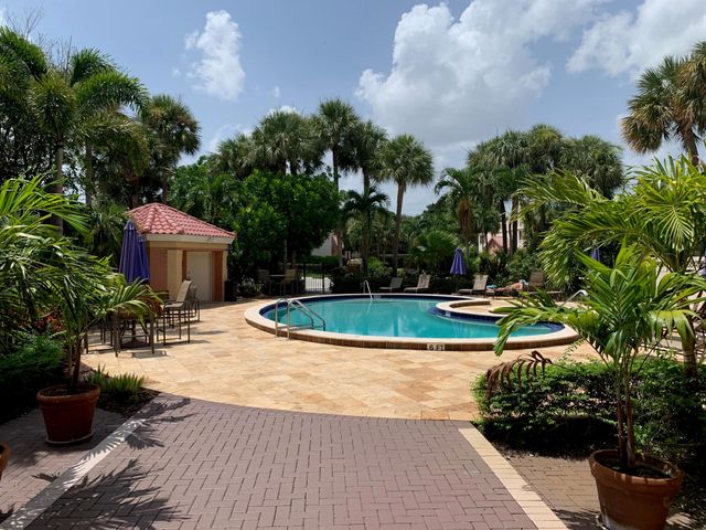 49 Uno Lago Drive, Juno Beach, FL 33408