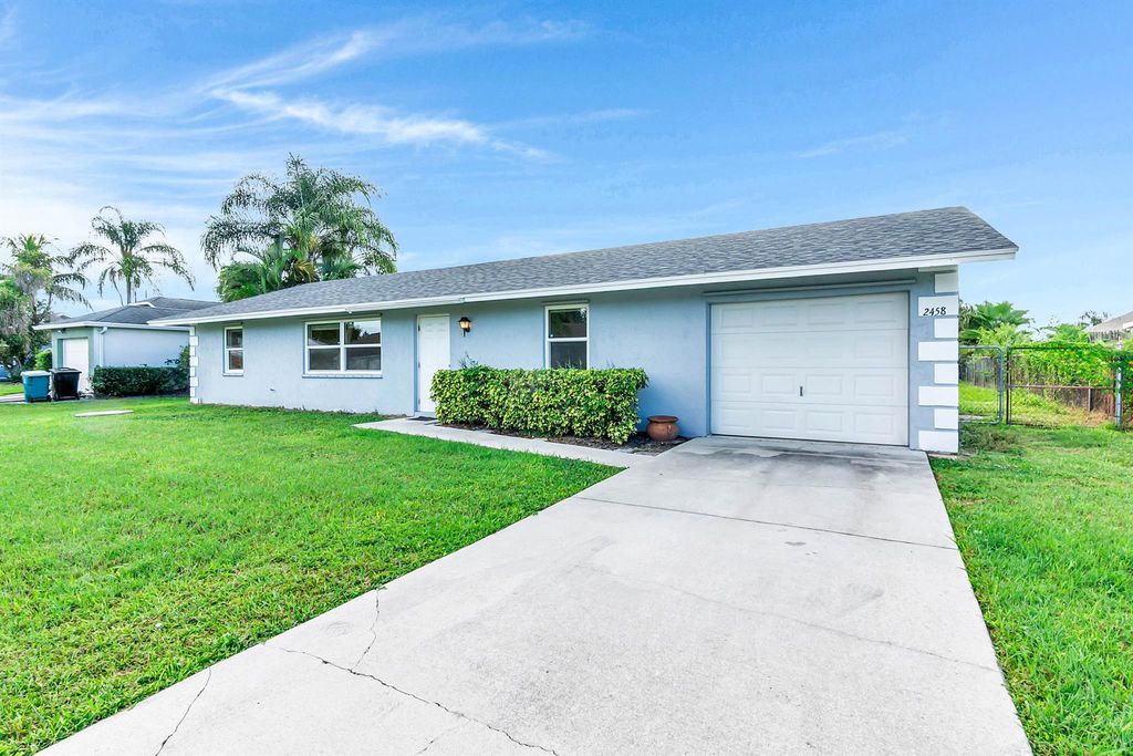 2458 SW Hinchman Street, Port St Lucie, FL 34984