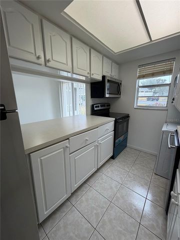 2419 SE 16TH AVENUE H, Ocala, FL 34471