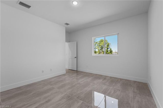 828 Genoa AVE S, Lehigh Acres, FL 33974