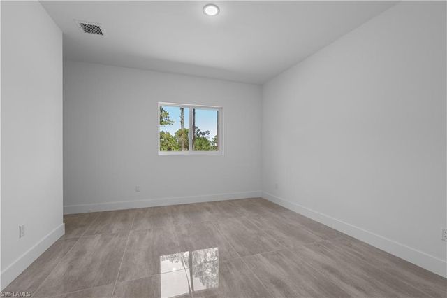 828 Genoa AVE S, Lehigh Acres, FL 33974