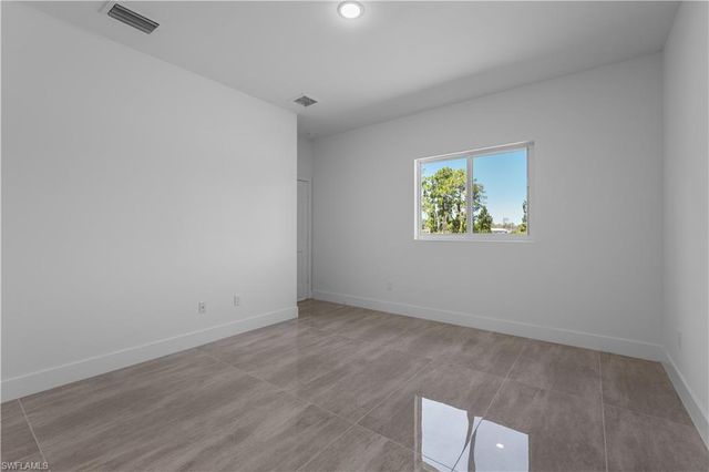 828 Genoa AVE S, Lehigh Acres, FL 33974