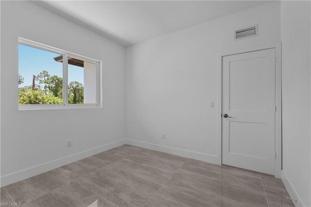 828 Genoa AVE S, Lehigh Acres, FL 33974