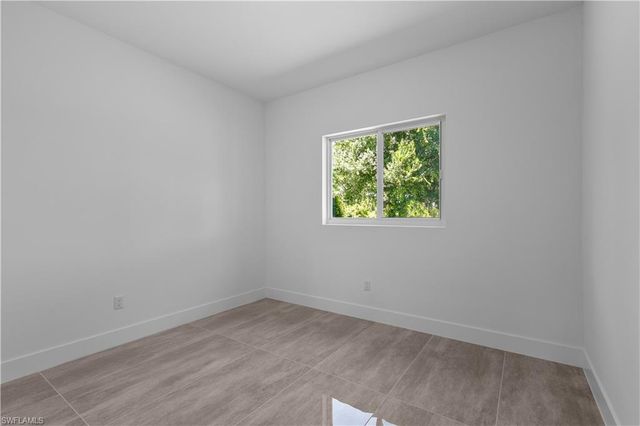 828 Genoa AVE S, Lehigh Acres, FL 33974