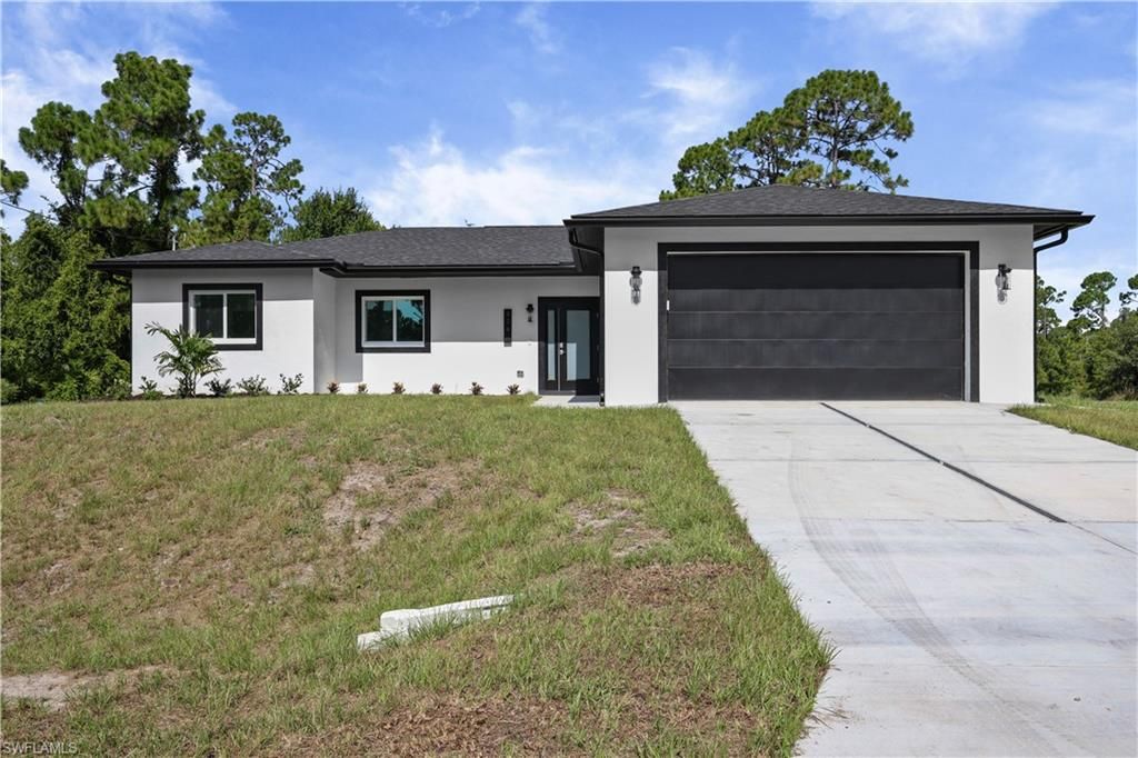 828 Genoa AVE S, Lehigh Acres, FL 33974