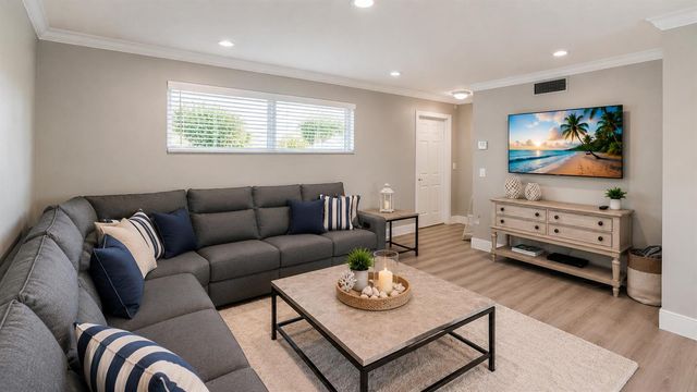 11 COLONIAL CLUB Drive 302, Boynton Beach, FL 33435