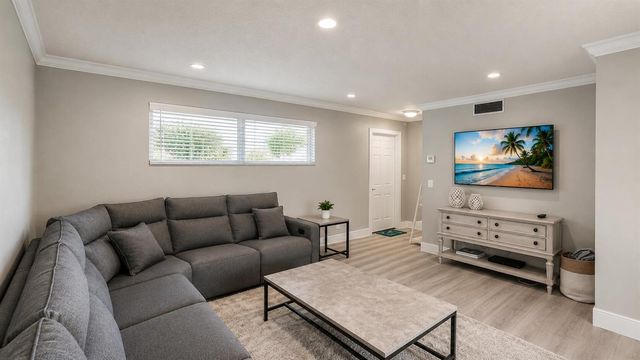 11 COLONIAL CLUB Drive 302, Boynton Beach, FL 33435