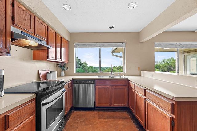 102 Rocky Creek RD, Dripping Springs, TX 78620