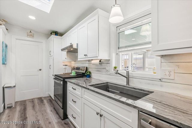 487 N Marlin Circle, Barefoot Bay, FL 32976