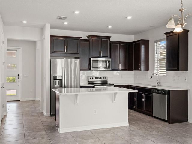 9008 EXPLORATION AVENUE, Orlando, FL 32832