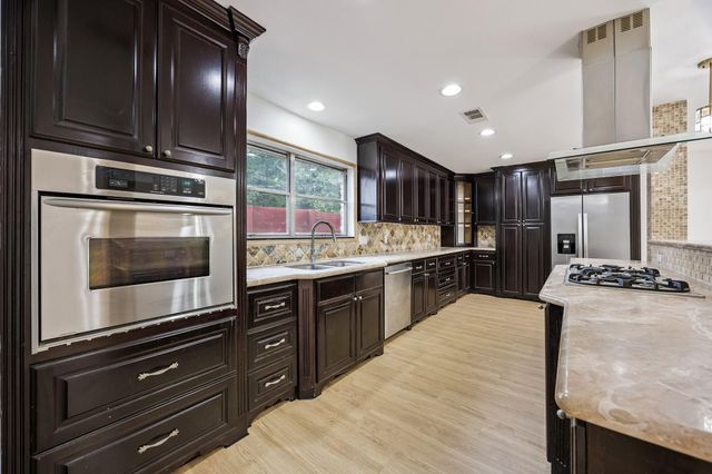 9418 Meadowbriar Lane, Houston, TX 77063